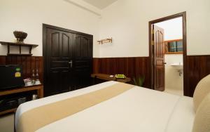 Ein Bett oder Betten in einem Zimmer der Unterkunft The Urban