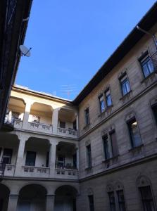 a large building with balconies on the side of it at Csengery Apartment in Budapest +6 photos