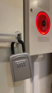 a red light attached to a wall with a box at 幸・3 in Osaka