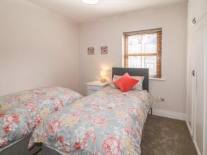 Letto o letti in una camera di Owen Tucker View House