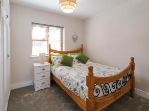 Letto o letti in una camera di Owen Tucker View House