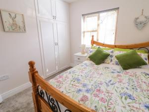 Letto o letti in una camera di Owen Tucker View House