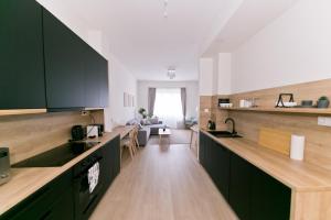 Kuchyňa alebo kuchynka v ubytovaní Madách Fox Apartment