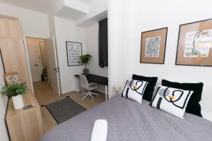 Posteľ alebo postele v izbe v ubytovaní Madách Fox Apartment