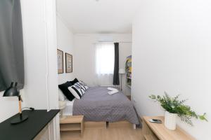 Posteľ alebo postele v izbe v ubytovaní Madách Fox Apartment