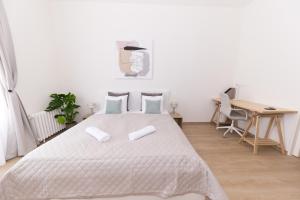 Posteľ alebo postele v izbe v ubytovaní Madách Fox Apartment