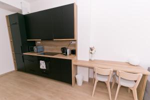 Kuchyňa alebo kuchynka v ubytovaní Madách Fox Apartment