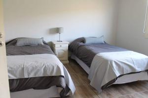 Кровать или кровати в номере Casa en estancia Patagónica