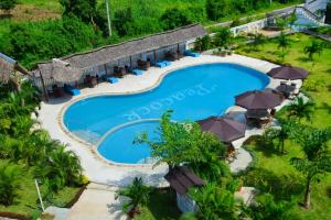 an overhead view of a swimming pool at a resort at White Peacock Resort Mtwapa in Mtwapa