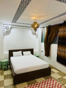 Postel nebo postele na pokoji v ubytování Riad Cascada + 36 fotografií