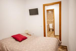 A bed or beds in a room at Rollo Campillo