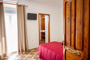 A bed or beds in a room at Rollo Campillo