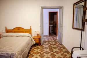 A bed or beds in a room at Rollo Campillo