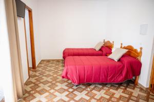 A bed or beds in a room at Rollo Campillo