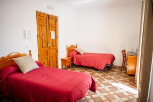 A bed or beds in a room at Rollo Campillo
