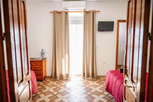 A bed or beds in a room at Rollo Campillo