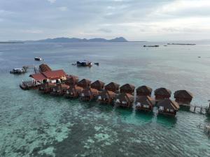 an aerial view of a resort in the water at Sea Star Resort Semporna in Semporna