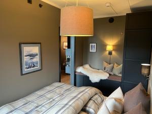 Postel nebo postele na pokoji v ubytování Spacious and modern apartment in the heart of Geilo, perfect year round!