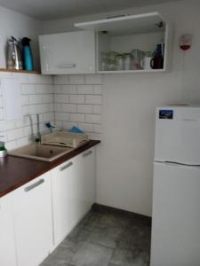 Kuchyňa alebo kuchynka v ubytovaní ARLA Studio