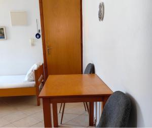 Postel nebo postele na pokoji v ubytování Irene Apartment