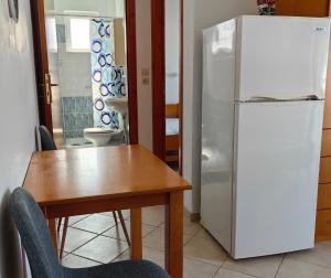 Kuchyň nebo kuchyňský kout v ubytování Irene Apartment