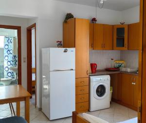 Kuchyň nebo kuchyňský kout v ubytování Irene Apartment
