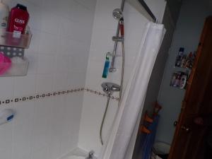 a bathroom with a shower with a shower curtain at enjoy your stay in Chester