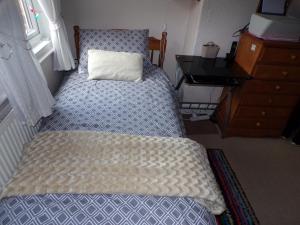 Postel nebo postele na pokoji v ubytování enjoy your stay