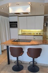 Dapur atau dapur kecil di BeautyD Familie- of gezinskamer JUNIOR-SUITE centrum Gullegem