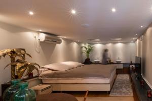 Area tempat duduk di BeautyD Familie- of gezinskamer JUNIOR-SUITE centrum Gullegem