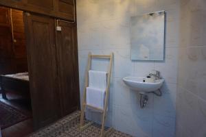 Koupelna v ubytování Le Desa Resort Syariah + 37 fotografií