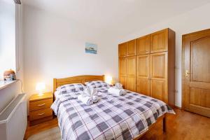 Postel nebo postele na pokoji v ubytování Villa Stipino