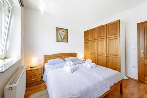 Postel nebo postele na pokoji v ubytování Villa Stipino