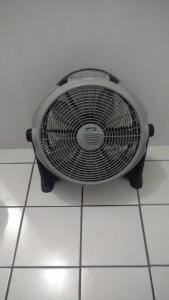 a fan sitting on a white tiled floor at Q'entiHospedaje San Blas 1 in Cusco