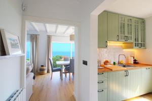 Kuchyň nebo kuchyňský kout v ubytování Marina House + 20 fotografií