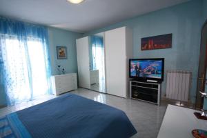 TV a/nebo společenská místnost v ubytování B&B Il Moai