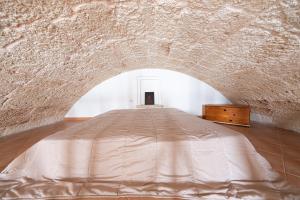 Łóżko lub łóżka w pokoju w obiekcie Casa a Santa Maria di Leuca