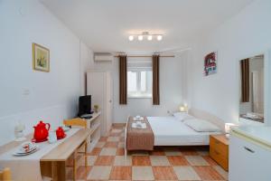 Postel nebo postele na pokoji v ubytování Apartments Family Gligora