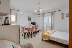 Postel nebo postele na pokoji v ubytování Apartments Family Gligora