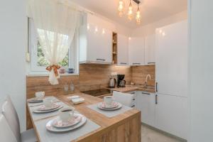 Kuchyň nebo kuchyňský kout v ubytování Apartments Family Gligora