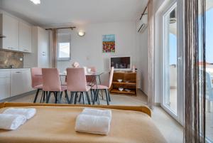 Kuchyň nebo kuchyňský kout v ubytování Apartments Family Gligora