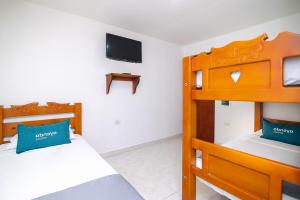 Postel nebo postele na pokoji v ubytování Hotel Esperanza AC