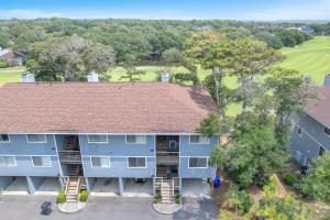 an overhead view of a blue apartment building with a roof at 36 Bunker Court in Caswell Beach