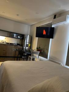 En TV eller et underholdningssystem på Kiran Lodging Guayaquil
