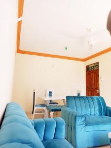 Un lugar para sentarse en Bliss homestay apartment with swimming pool