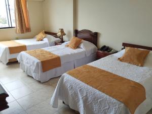 Postel nebo postele na pokoji v ubytování Hotel Khalifa