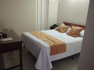 Postel nebo postele na pokoji v ubytování Hotel Khalifa