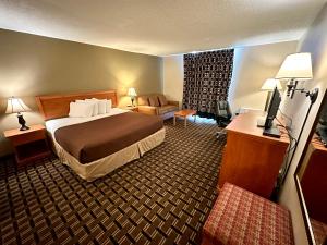 Postel nebo postele na pokoji v ubytování FairBridge Inn & Suites - Lewiston