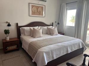 Voodi või voodid majutusasutuse Stanza Mare B-201, Beach Front Bavaro,,Best View, Fully Equipped, Private Beach, 3-R 3-B, Bavaro, Punta Cana toas