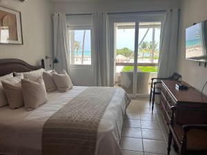 Voodi või voodid majutusasutuse Stanza Mare B-201, Beach Front Bavaro,,Best View, Fully Equipped, Private Beach, 3-R 3-B, Bavaro, Punta Cana toas
